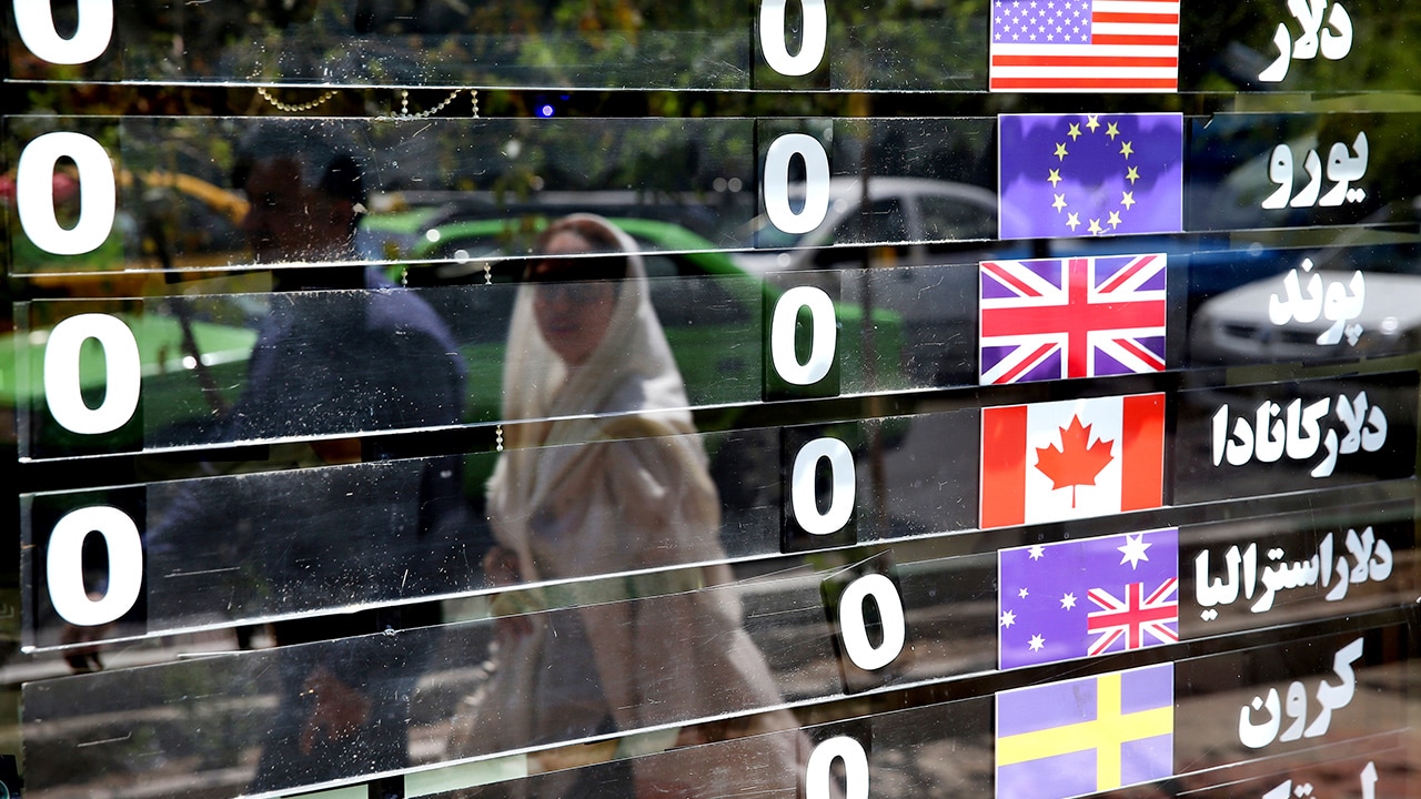Photo of a display of currencies on a money exchange shop in Iran