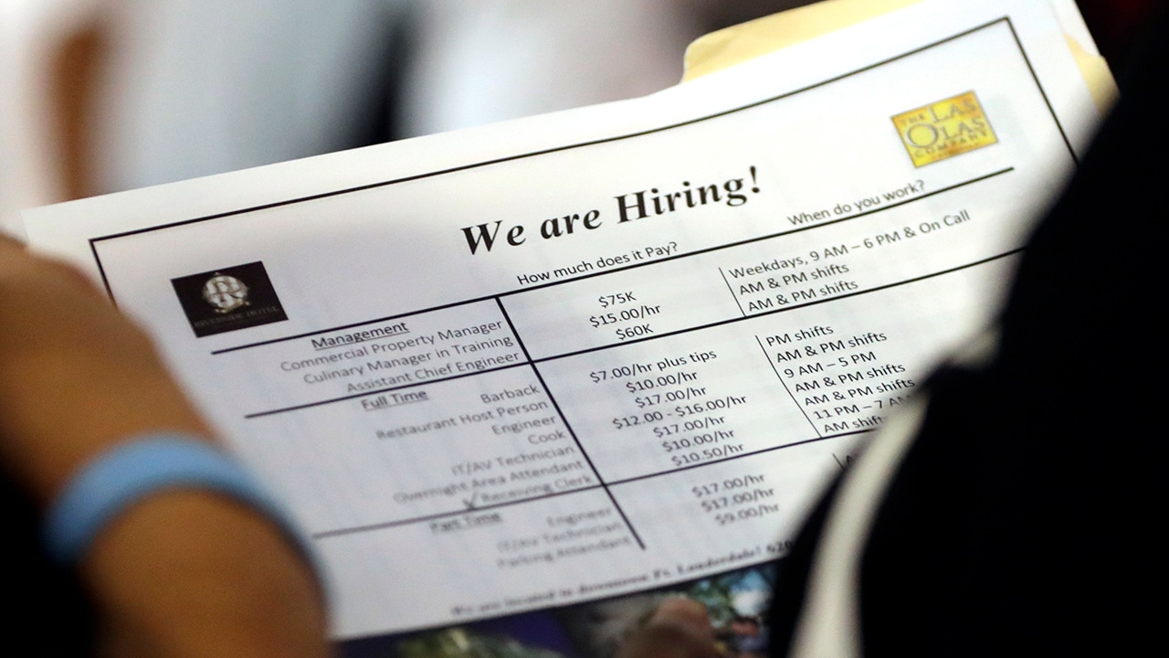 File photo of a job applicant looking at jobs