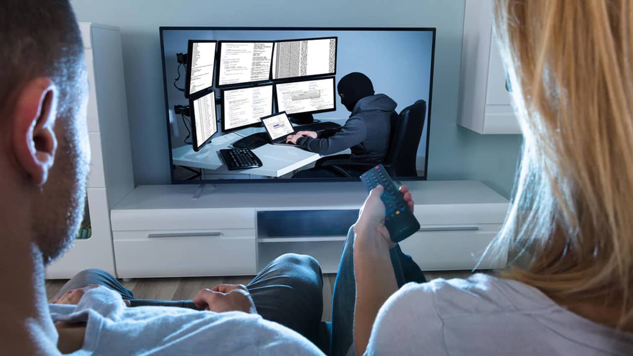 Photo of people watching tv.