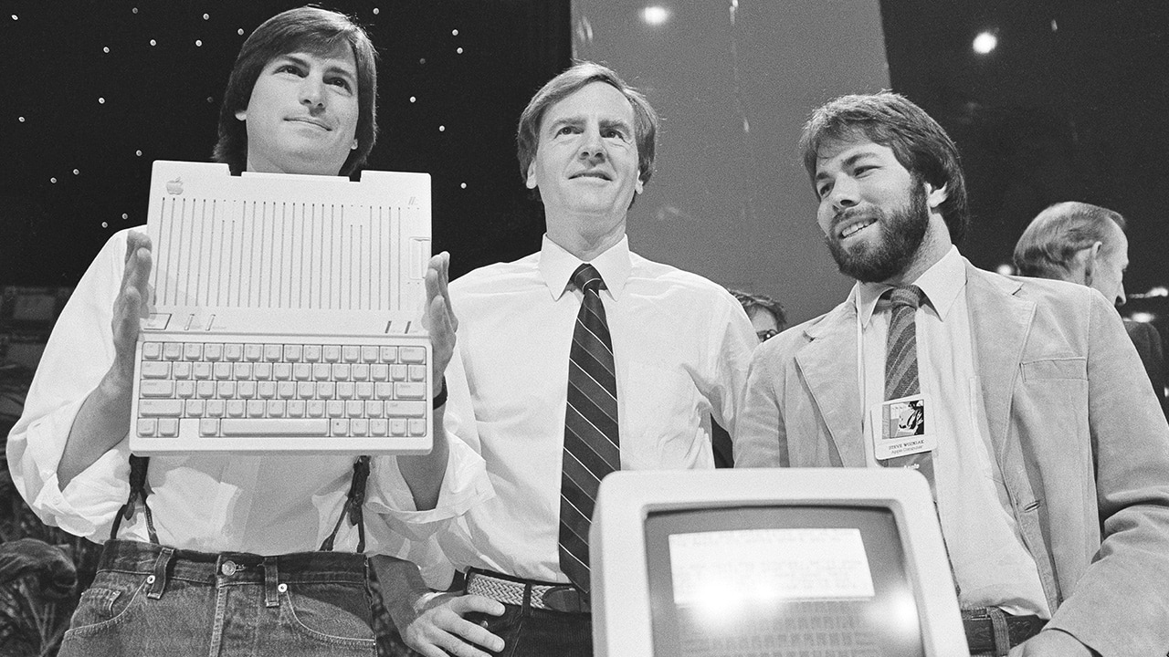 Photo of Steve Jobs, John Sculley, and Steve Wozniak in 1984