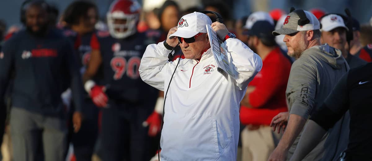 Photo of Fresno State head coach Jeff Tedford watching the game