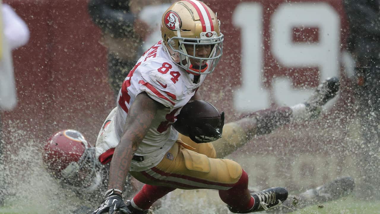 Photo of Kendrick Brown rushing the ball 