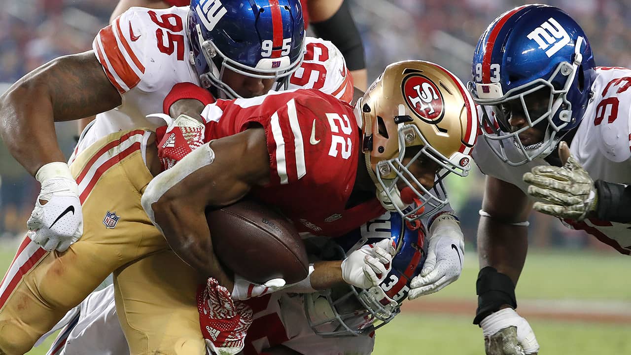 Photo of San Francisco 49ers running back Matt Breida being tackled