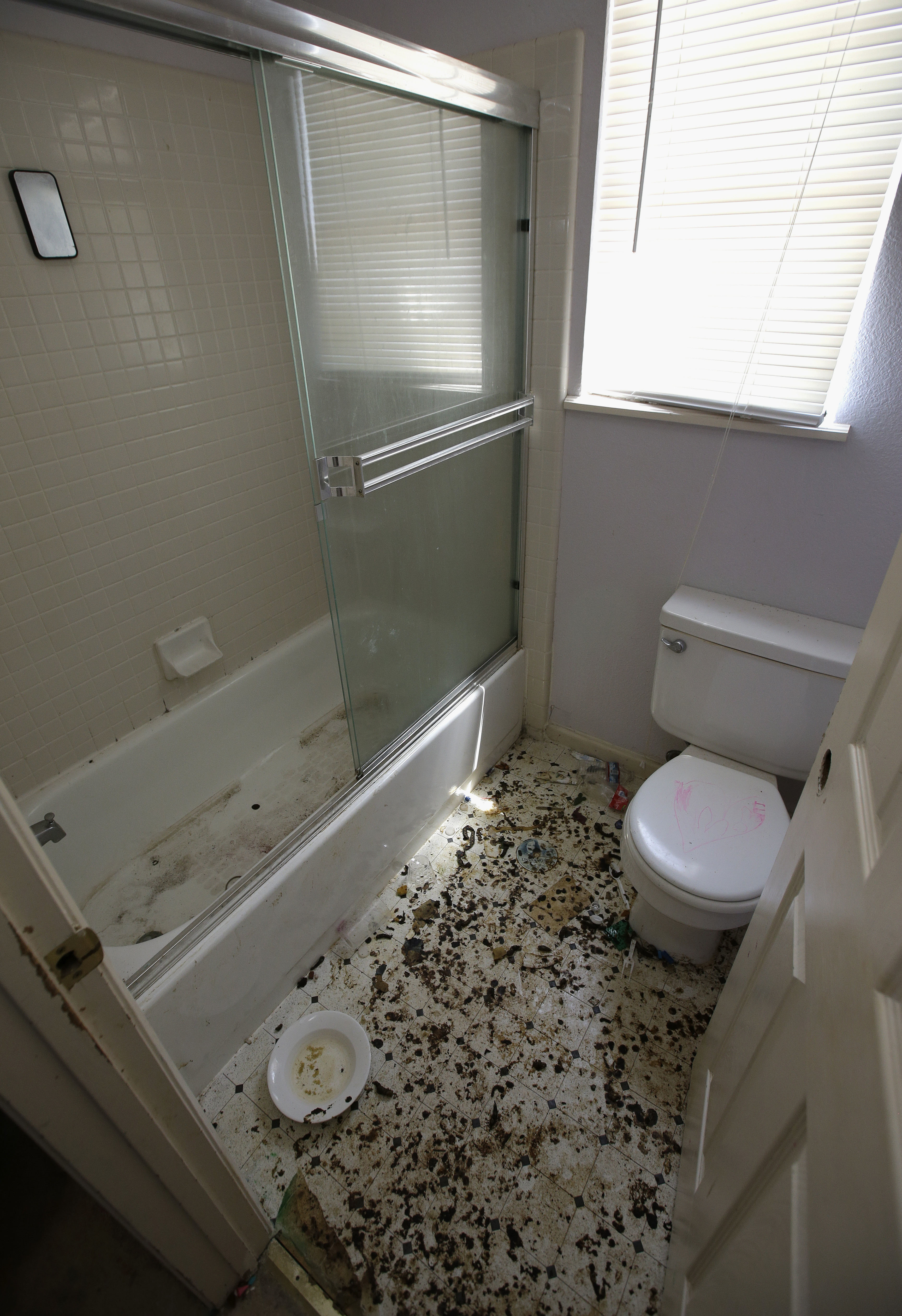 The bathroom located in the Rogers' home.