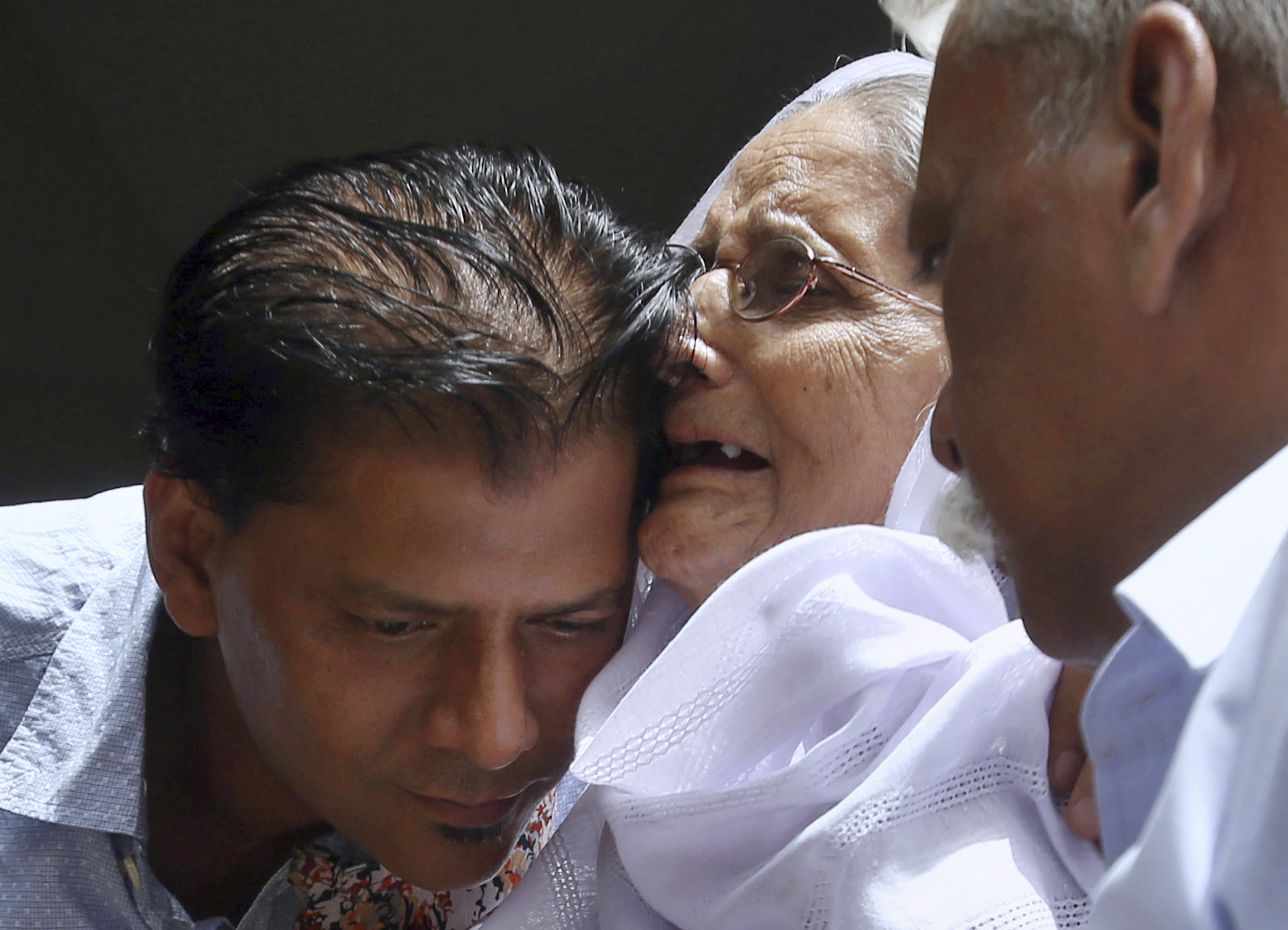Abdul Aziz Sheikh, left, father of Sabika Sheikh. 