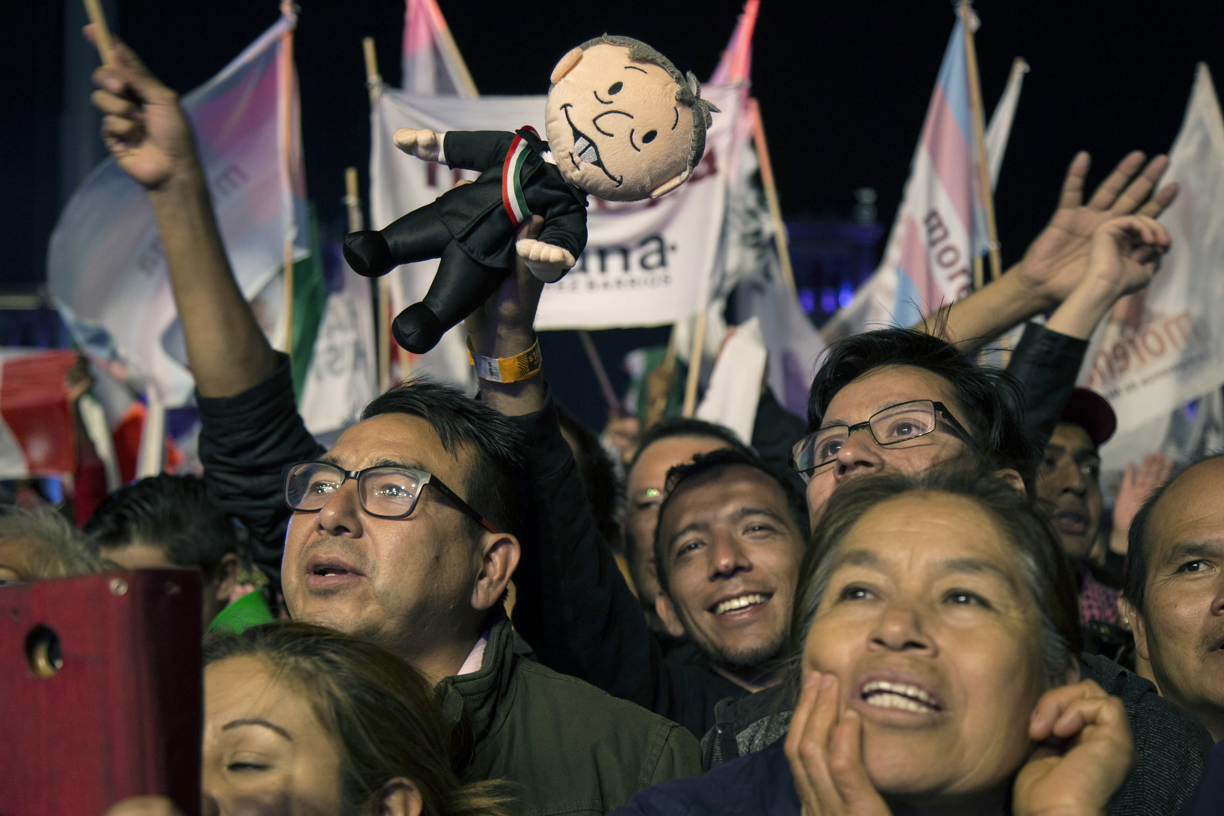 Photo of supporters cheering ndres Manuel Lopez Obrador's victory speech