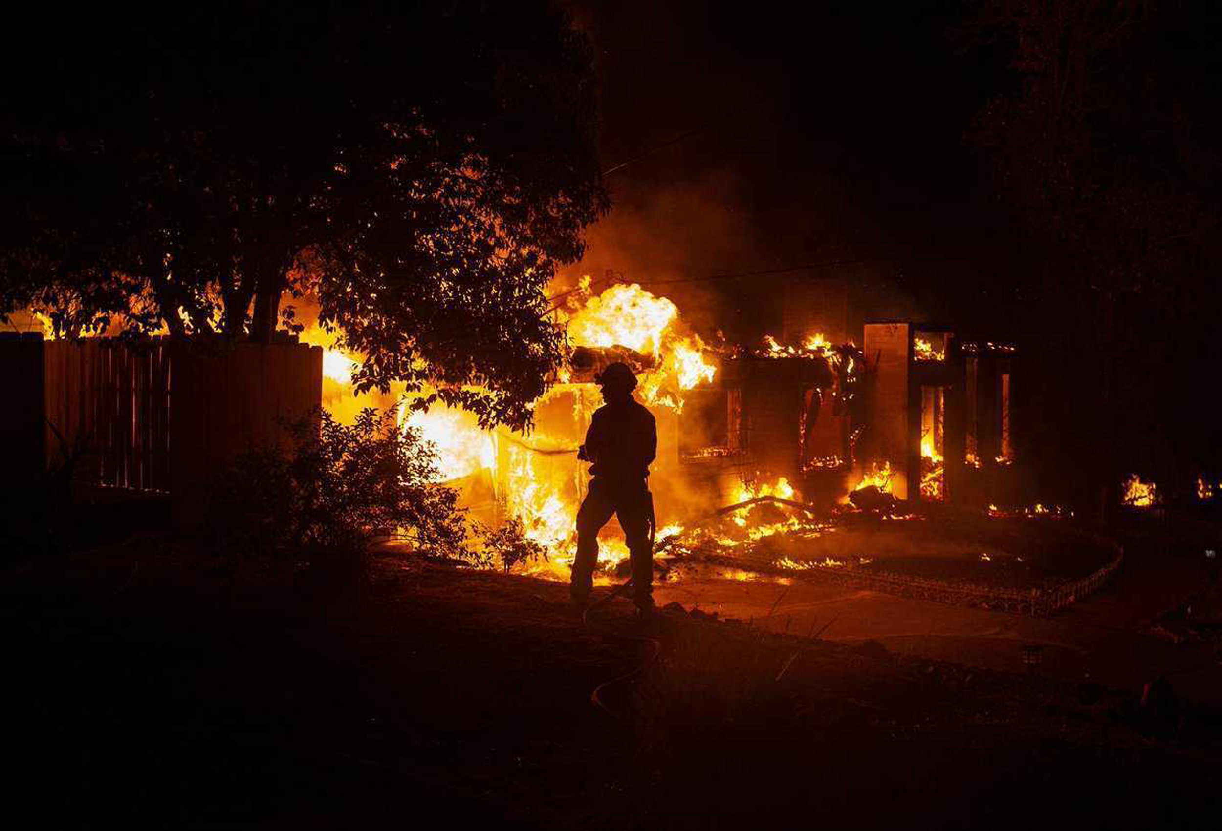 Photo of firefighter battling the Carr Fire in Redding, California