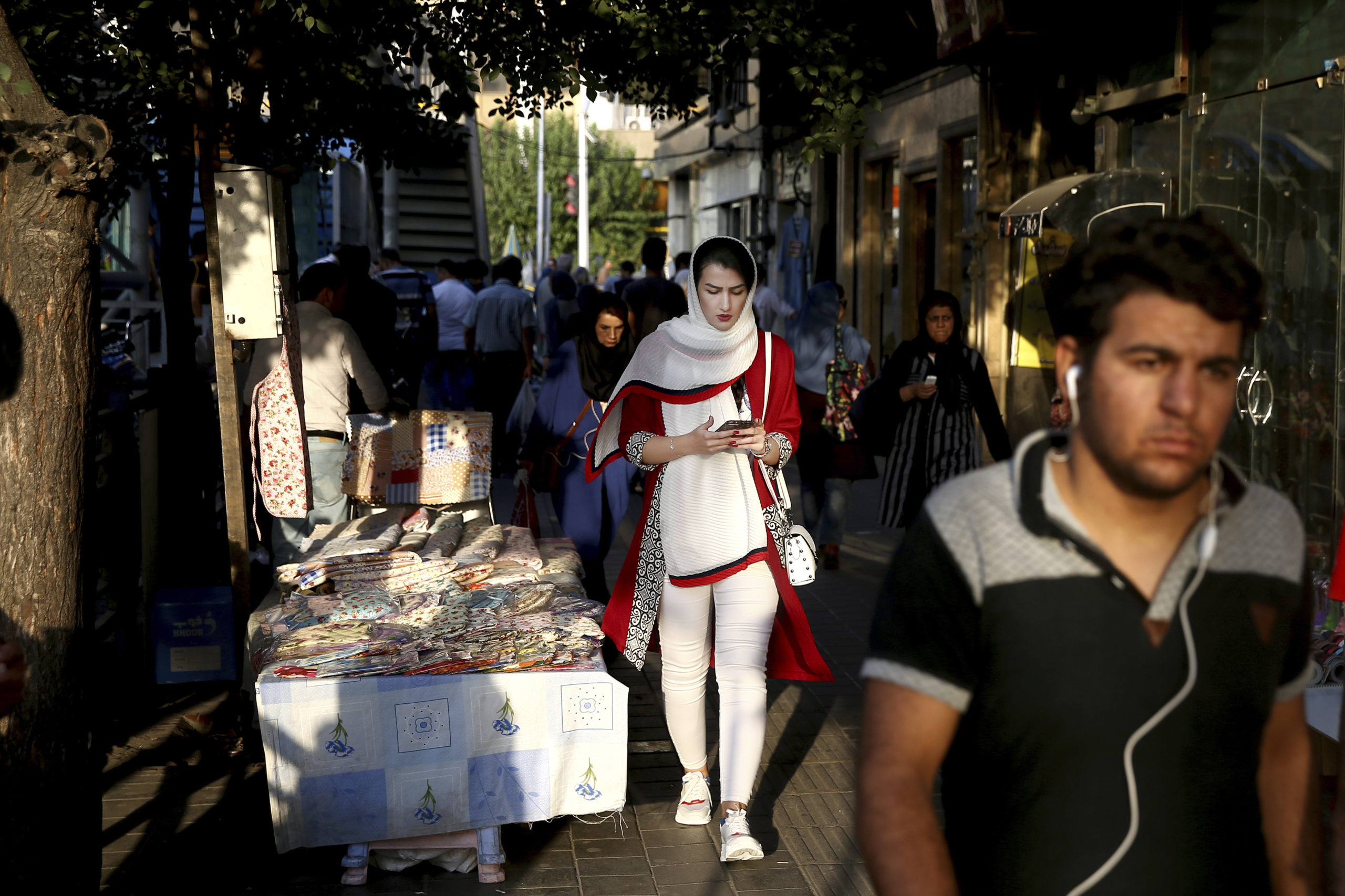 Photo of people walking in downtown Tehran, Iran.