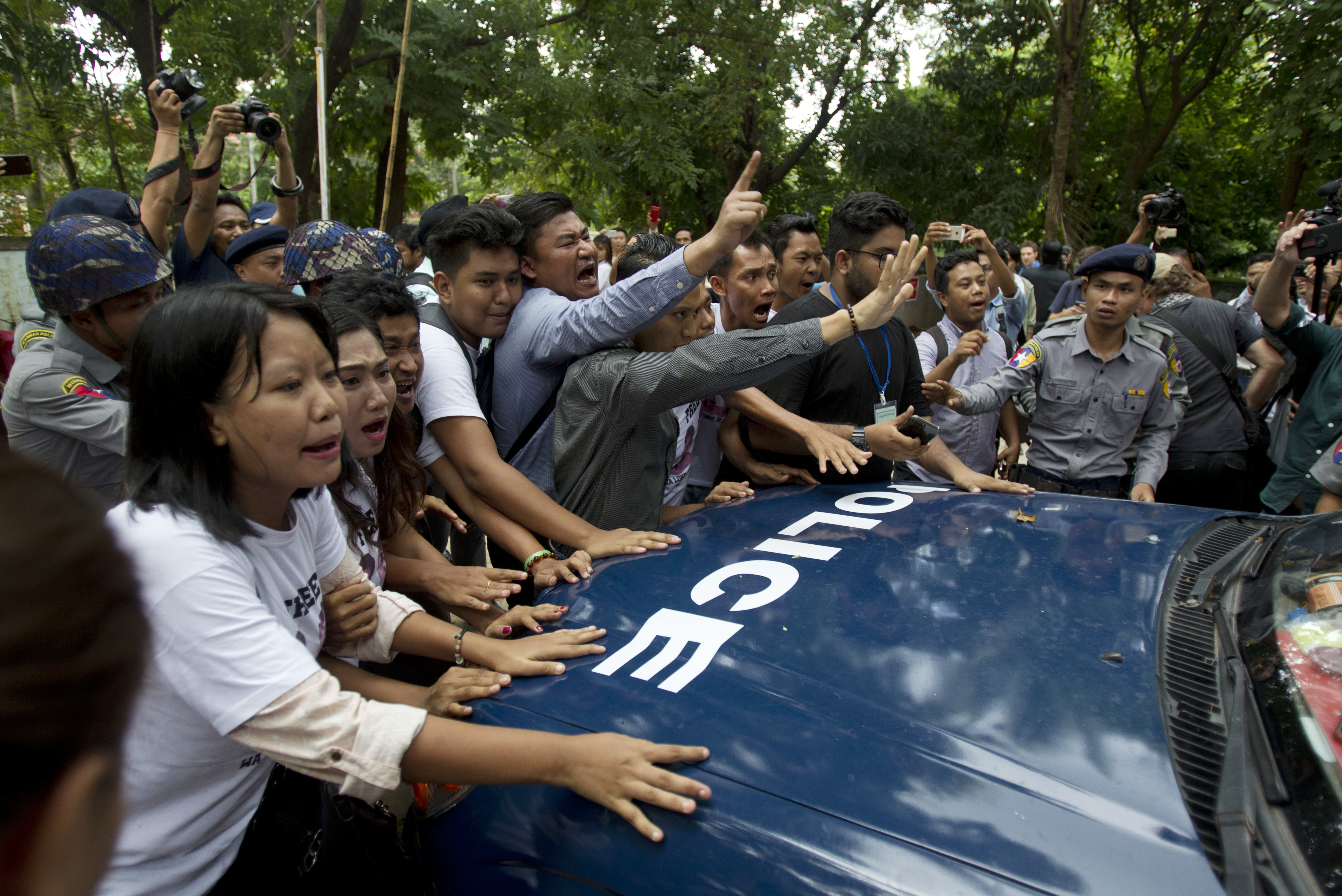 Photo of protesters following sentencing of Reuters journalists in Myanmar