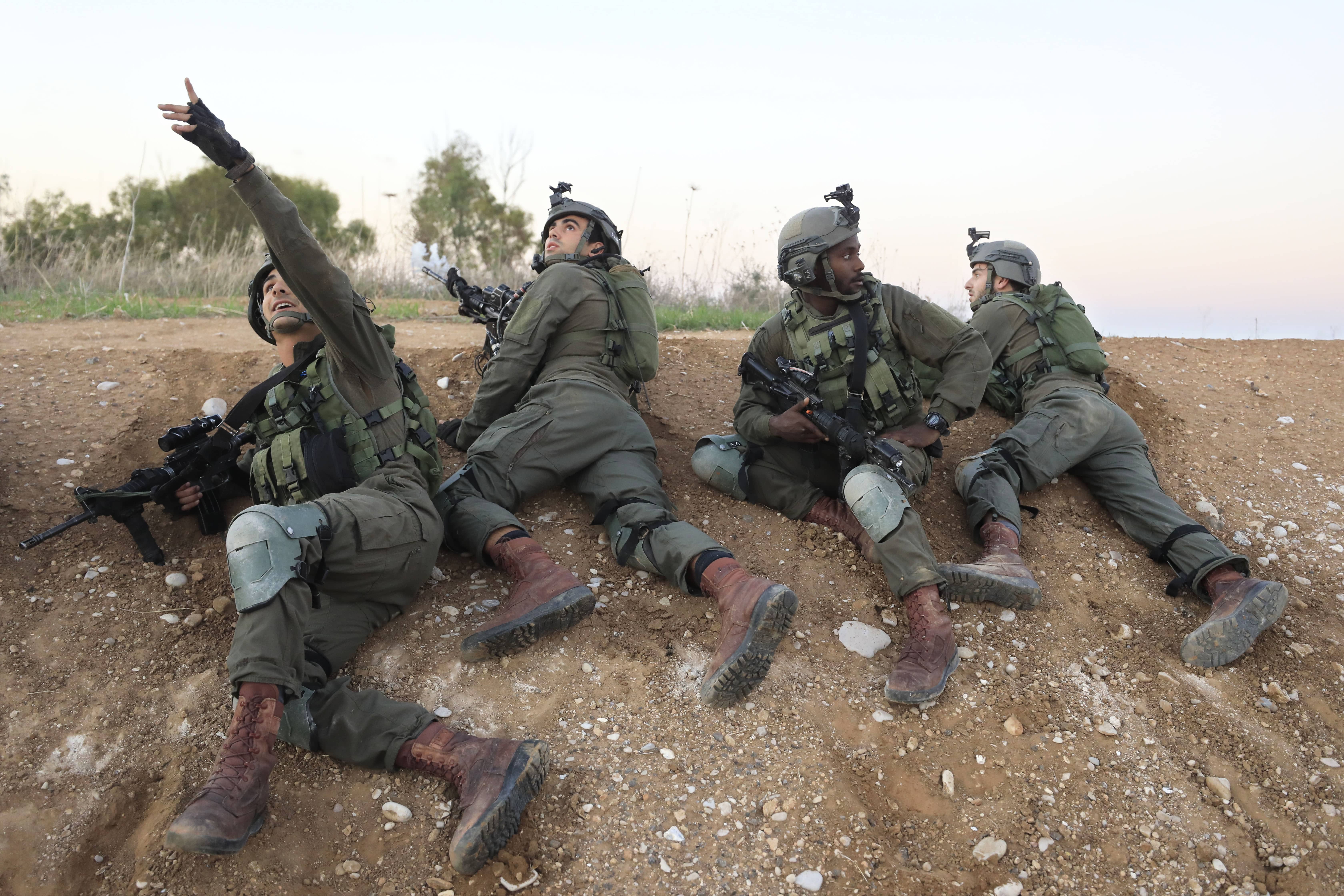Photo of Israeli soldiers taking cover 