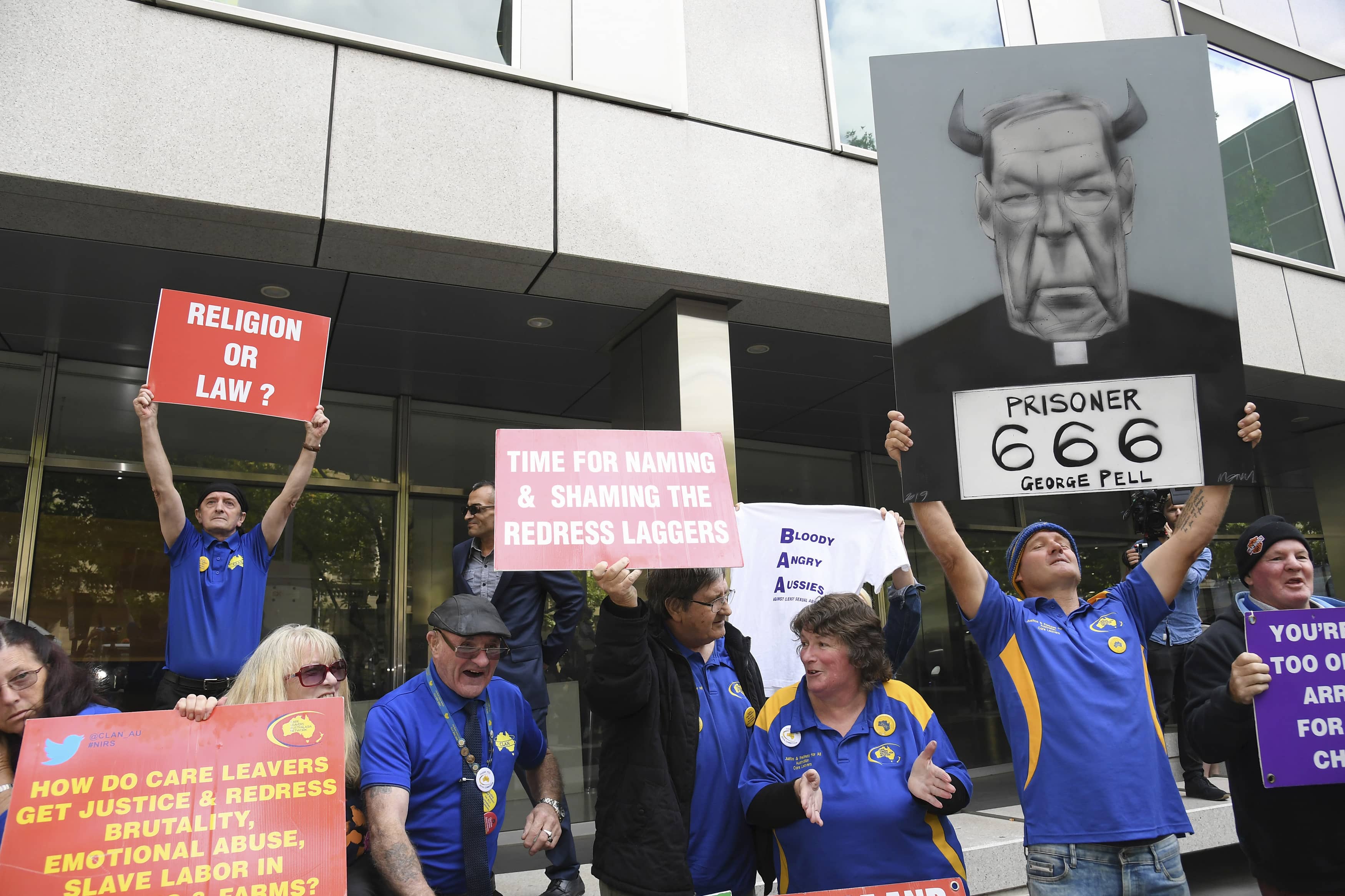 Photo of protestors during the sentence of Cardinal George Pell