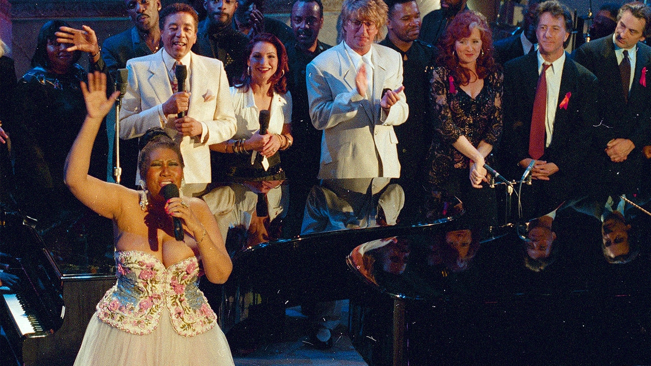 Photo of Aretha Franklin performing at an AIDS benefit concert