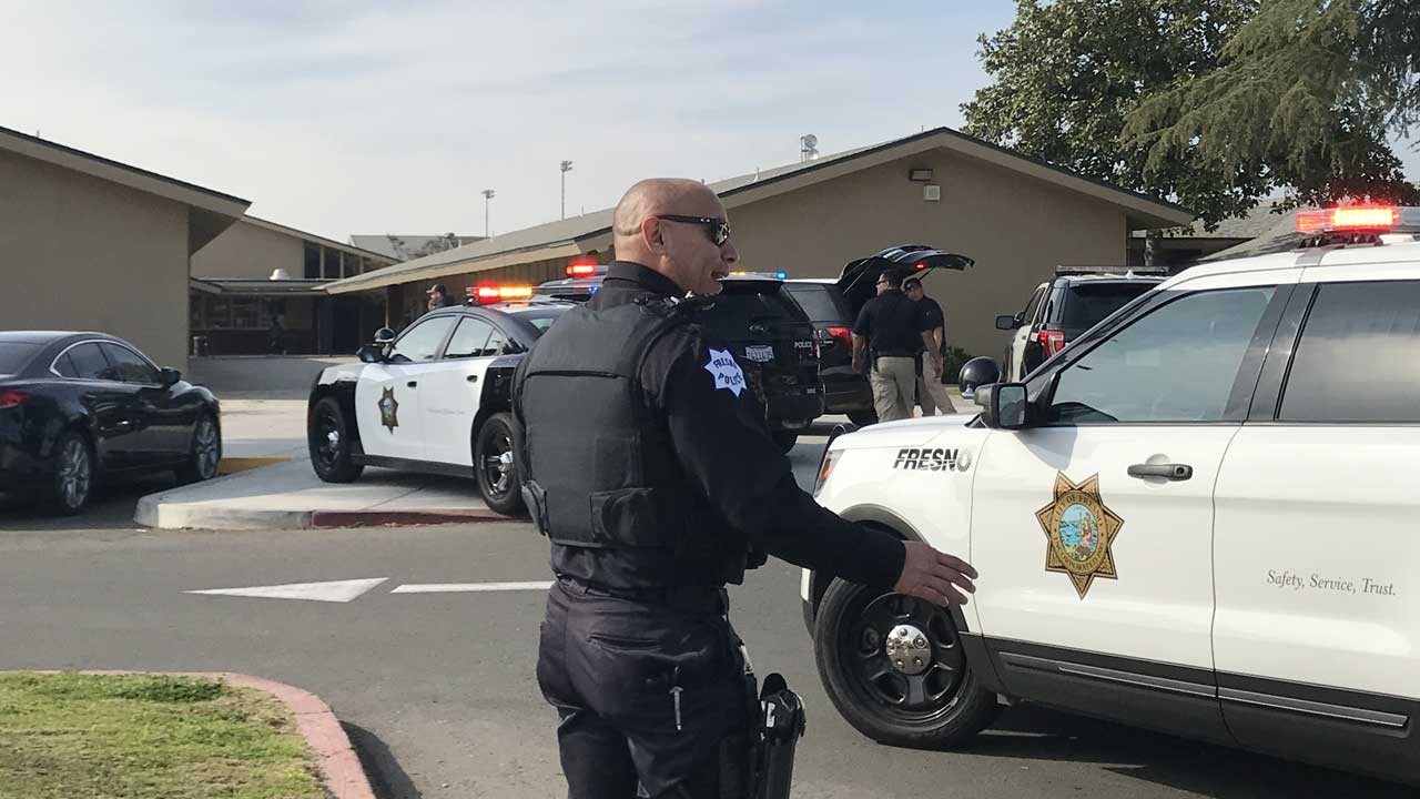 Photo of a Fresno Police officer at Bullard High School in Fresno, Ca.