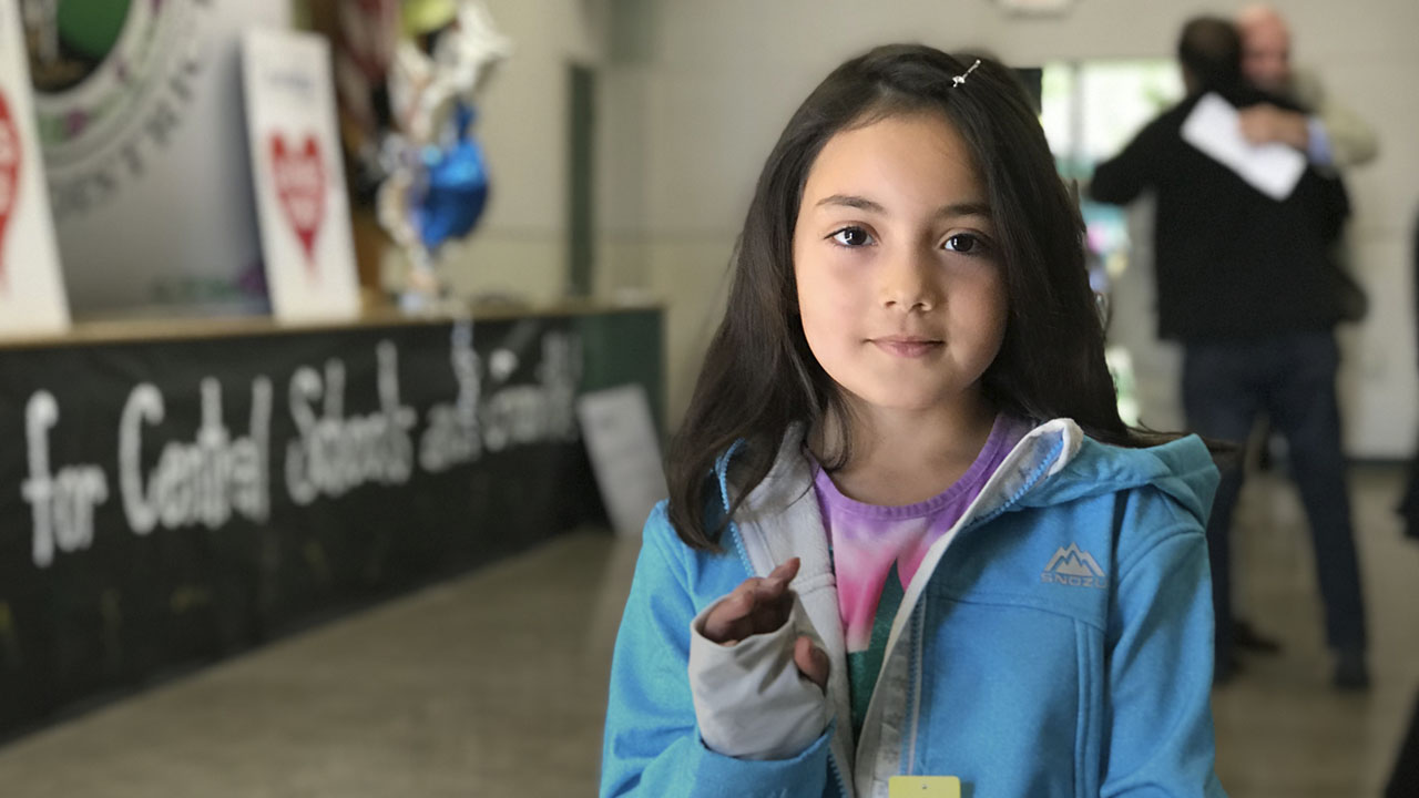 Central Unified student shows off her new winter coat