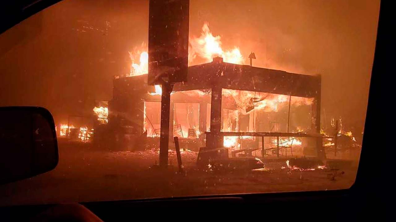 Photo of Cressman's Store burning below Shaver Lake during the Creek Fireel