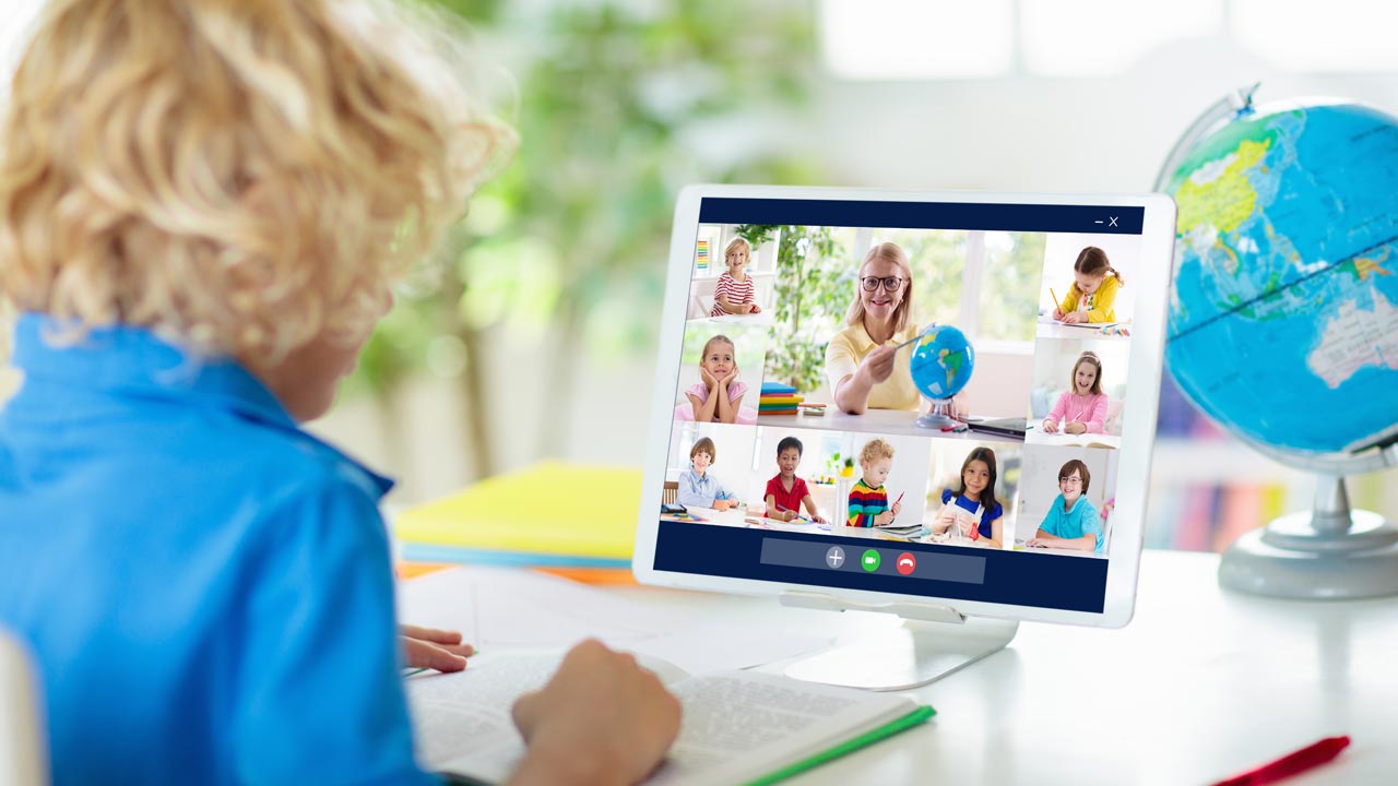 Image of a school teacher communicating with students online during the cornavirus pandemic