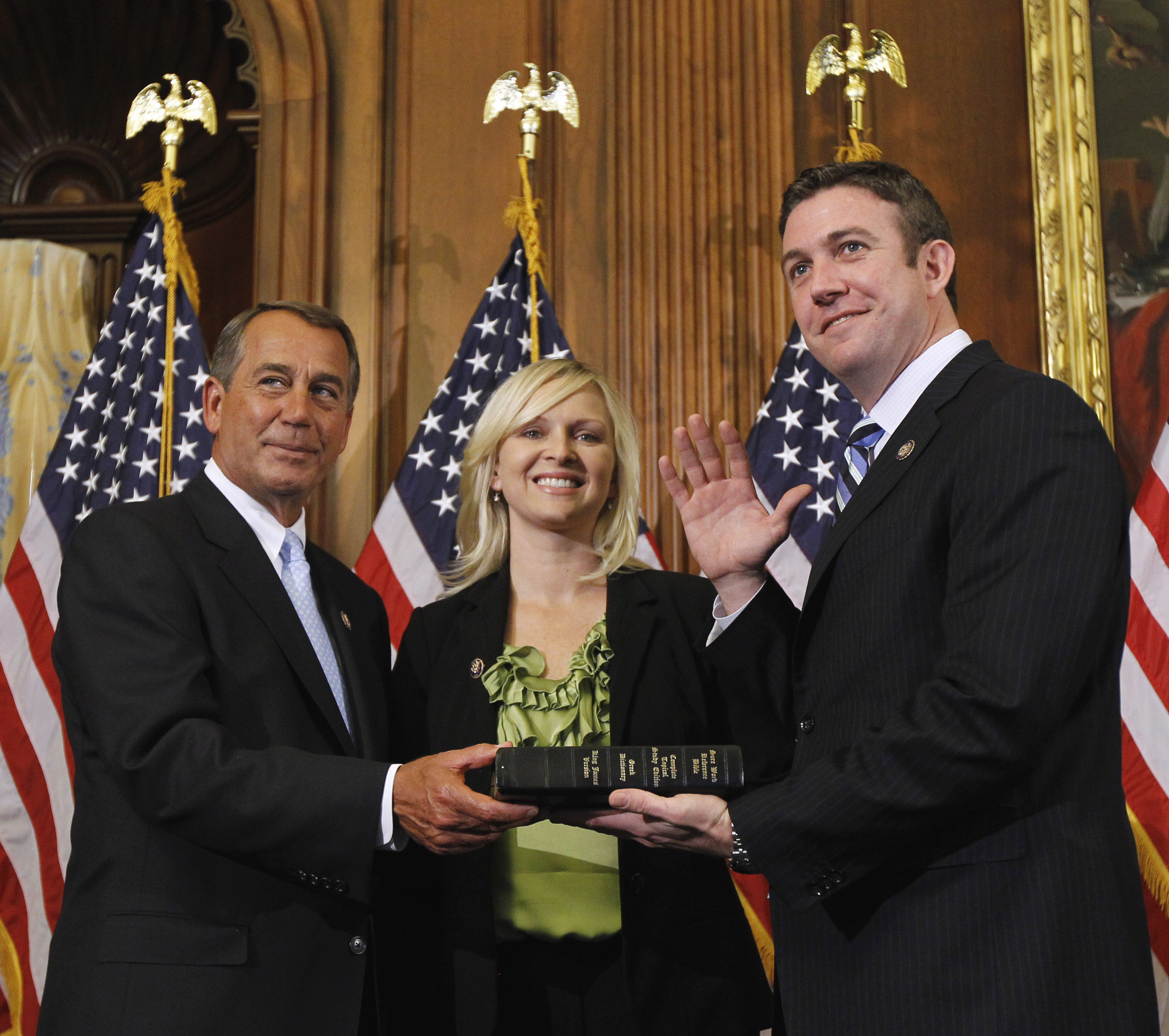 Photo of Duncan Hunter administering the House oath with his wife