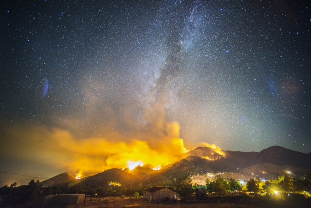 Photo of the Way Fire burning at night in the hills above Wofford Heights in California's Kern County.