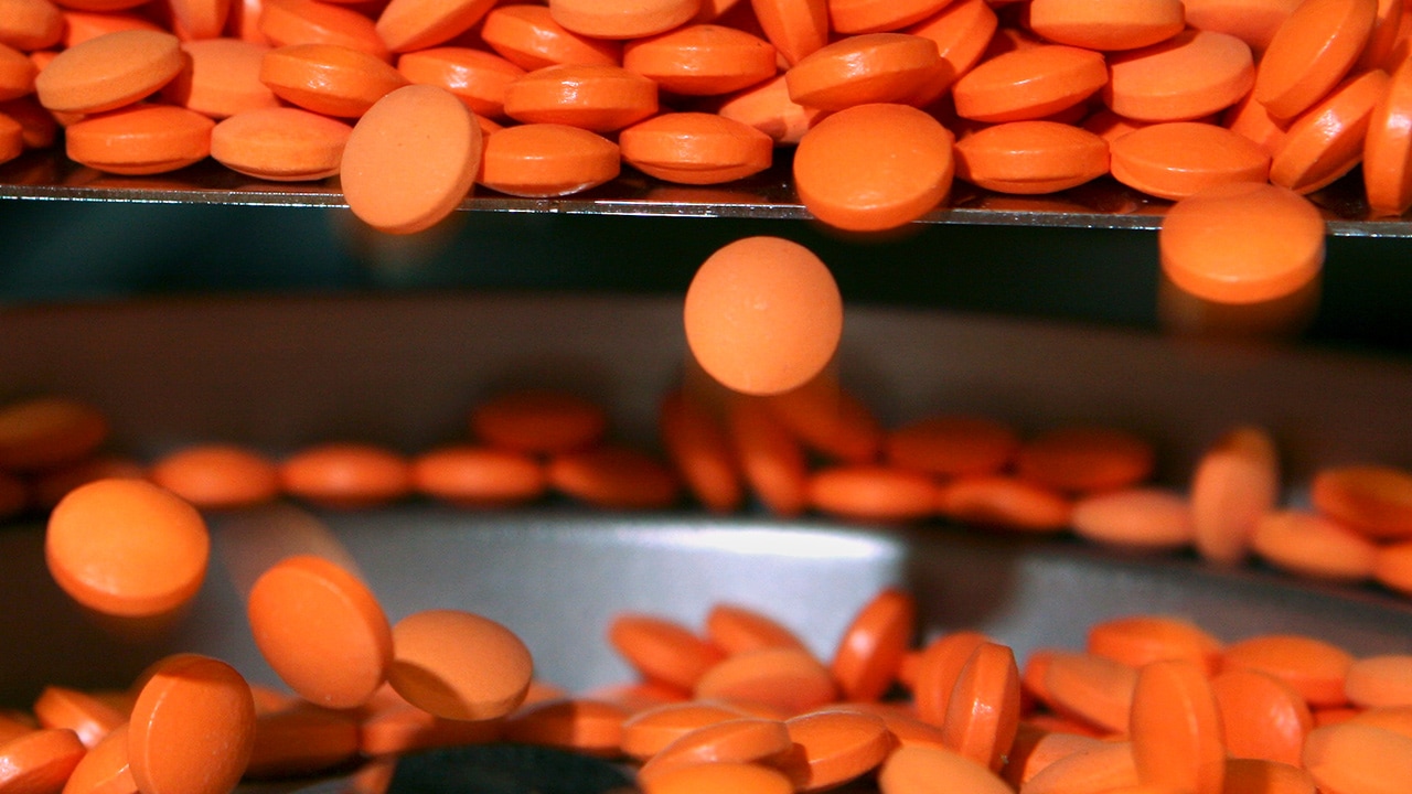 Photo of pills in a weighing machine