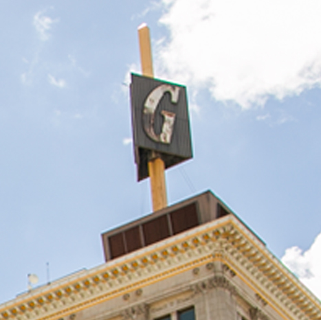 Picture of iconic 'G' sign on top of Guarantee Building in downtown Fresno