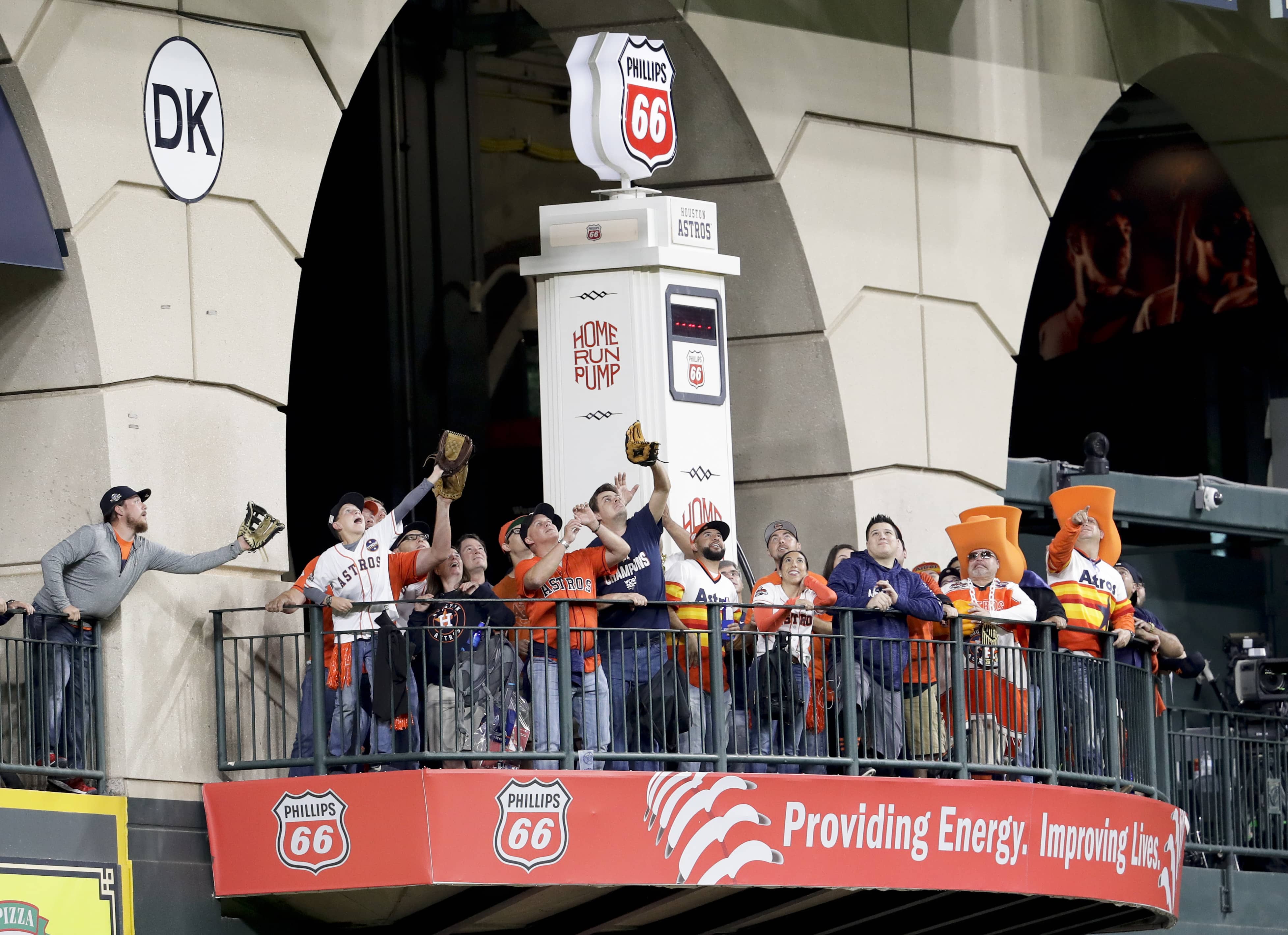 Photo of fans waiting for fly balls during batting practice before Game 4