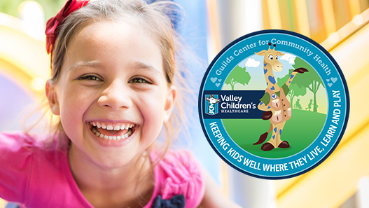 Photo of a smiling girl and logo for Valley Children's new center to promote children's health