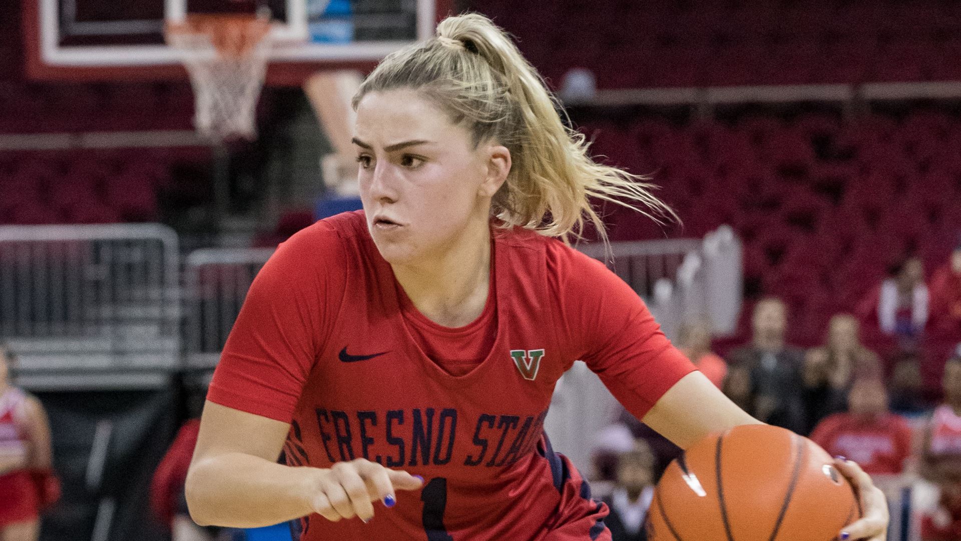 Photo of Haley Cavinder driving to the basket