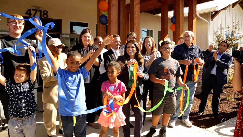 Photo of grand opening of Highway City resource center