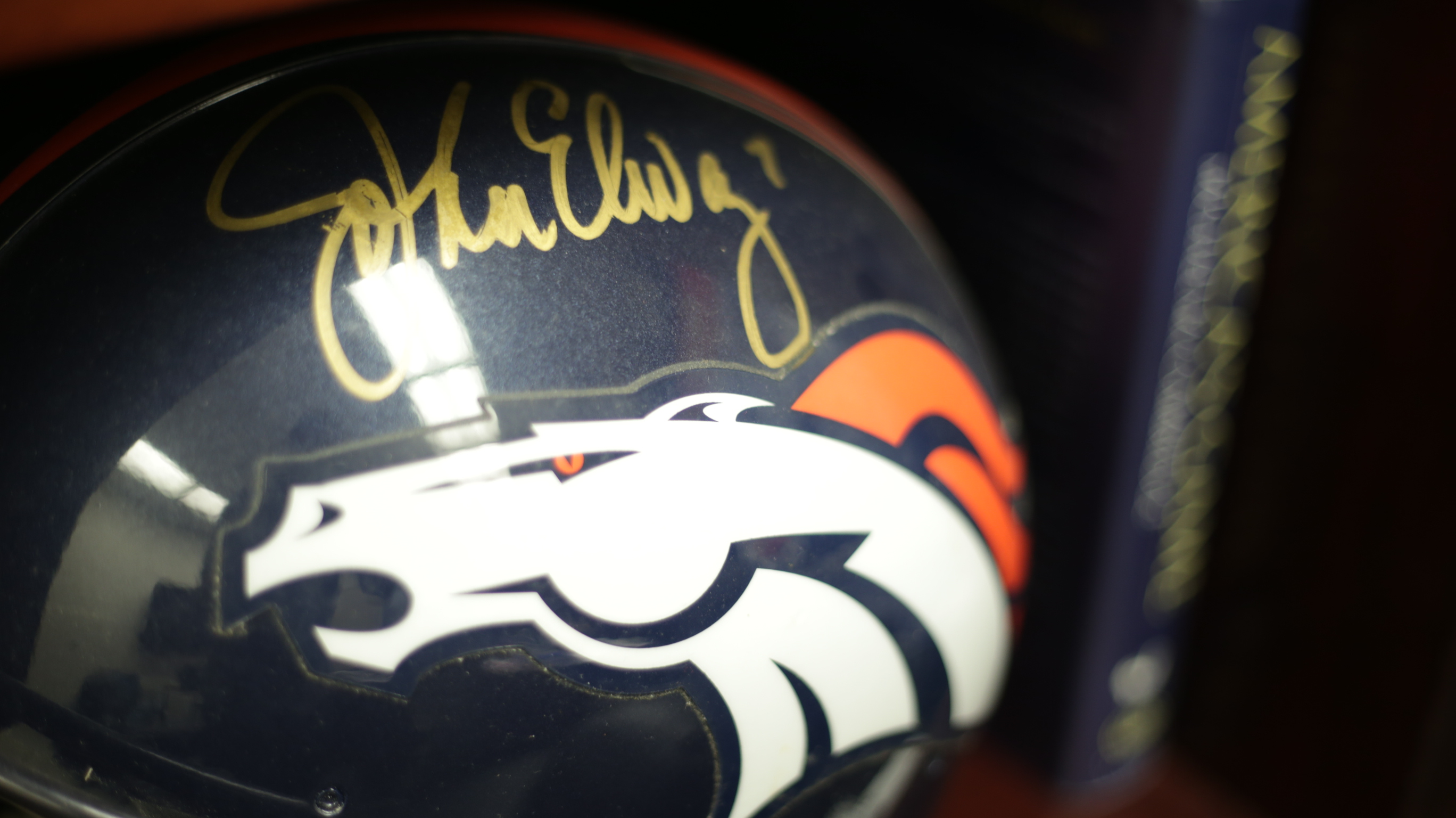 Photo of a Denver Broncos helmet signed John Elway