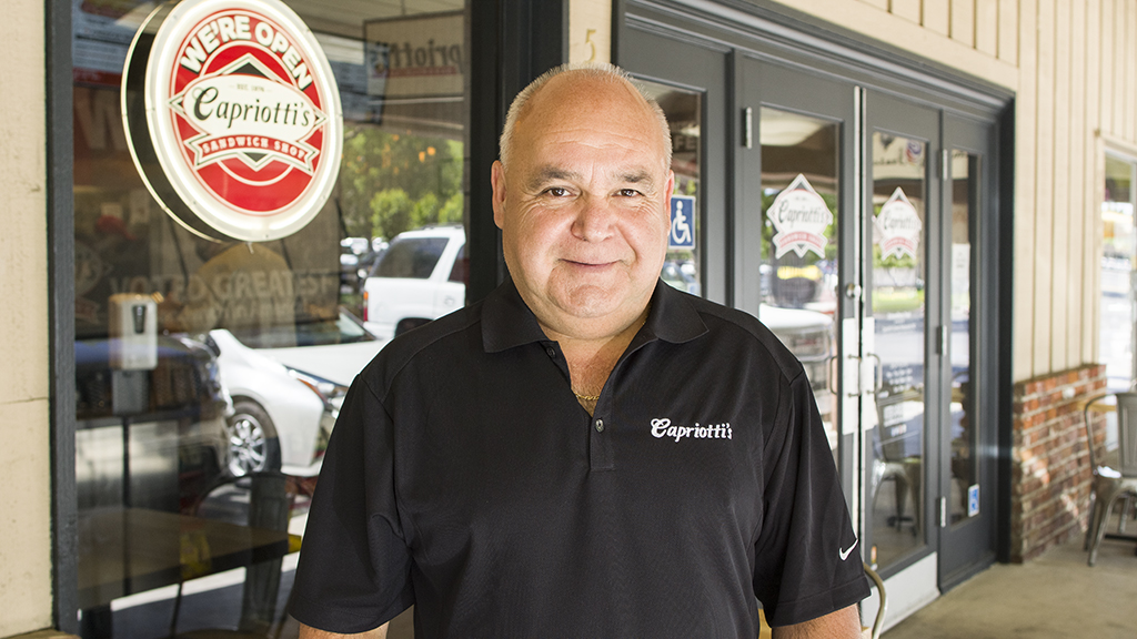 Portrait of Capriotti's Fresno location owner Javier Gomez