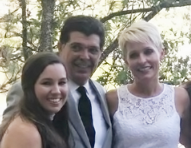 Mollie Tibbetts, left, with her father Rob and step-mother Kacey
