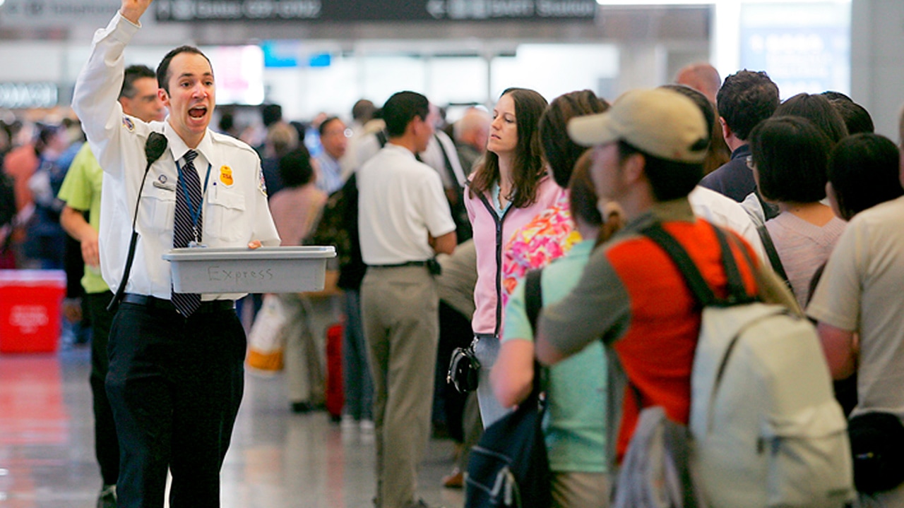 Photo of TSA agents and crowd