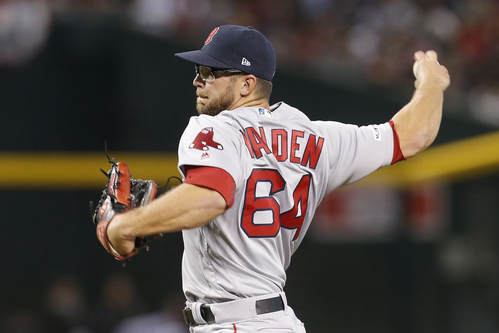 Photo of Boston Red Sox relief picture Marcus Walden delivering a pitch to the plate.
