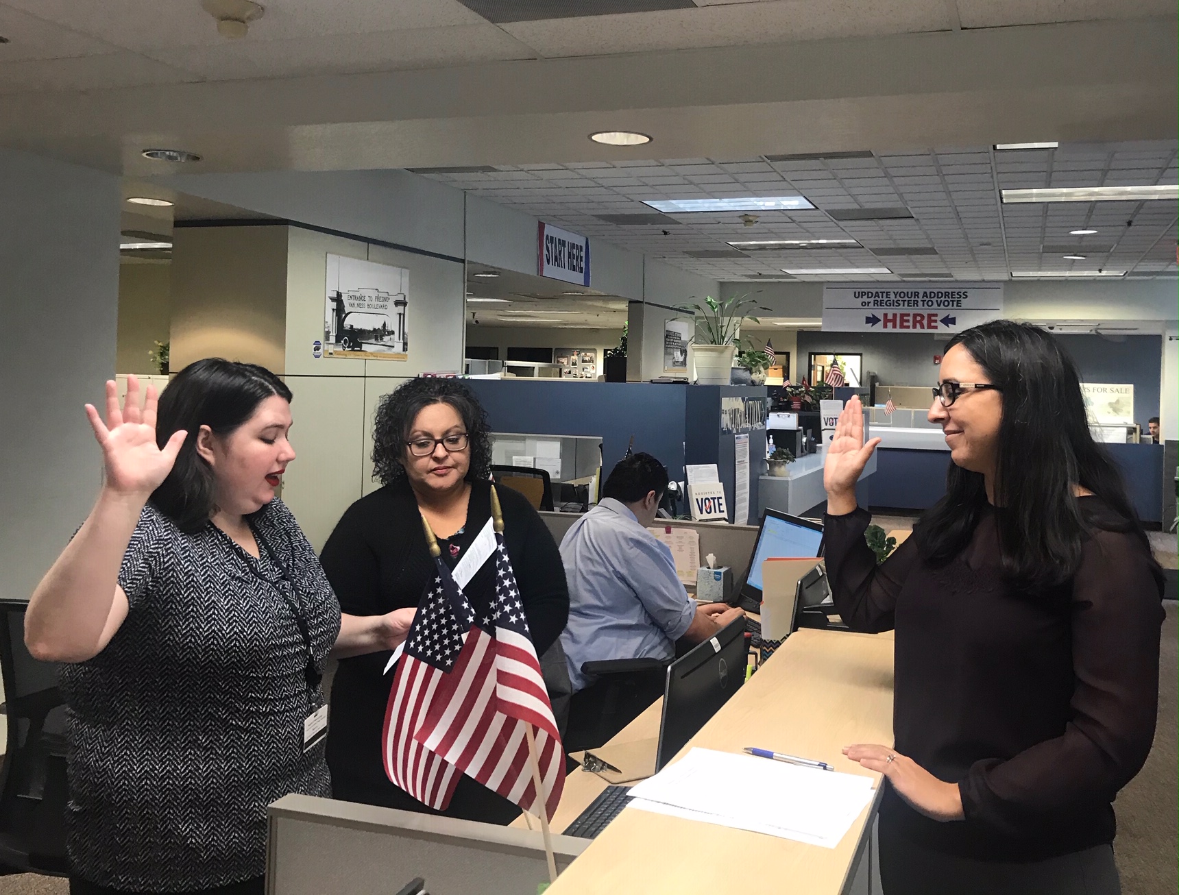 Photo of Nasreen Johnson taking out papers to run for office