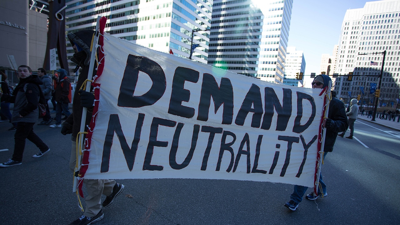 Photo of protestors advocating for net neutrality