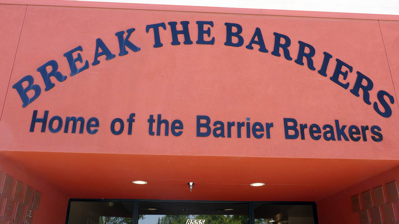 Image of the Break the Barriers sign in Fresno, California