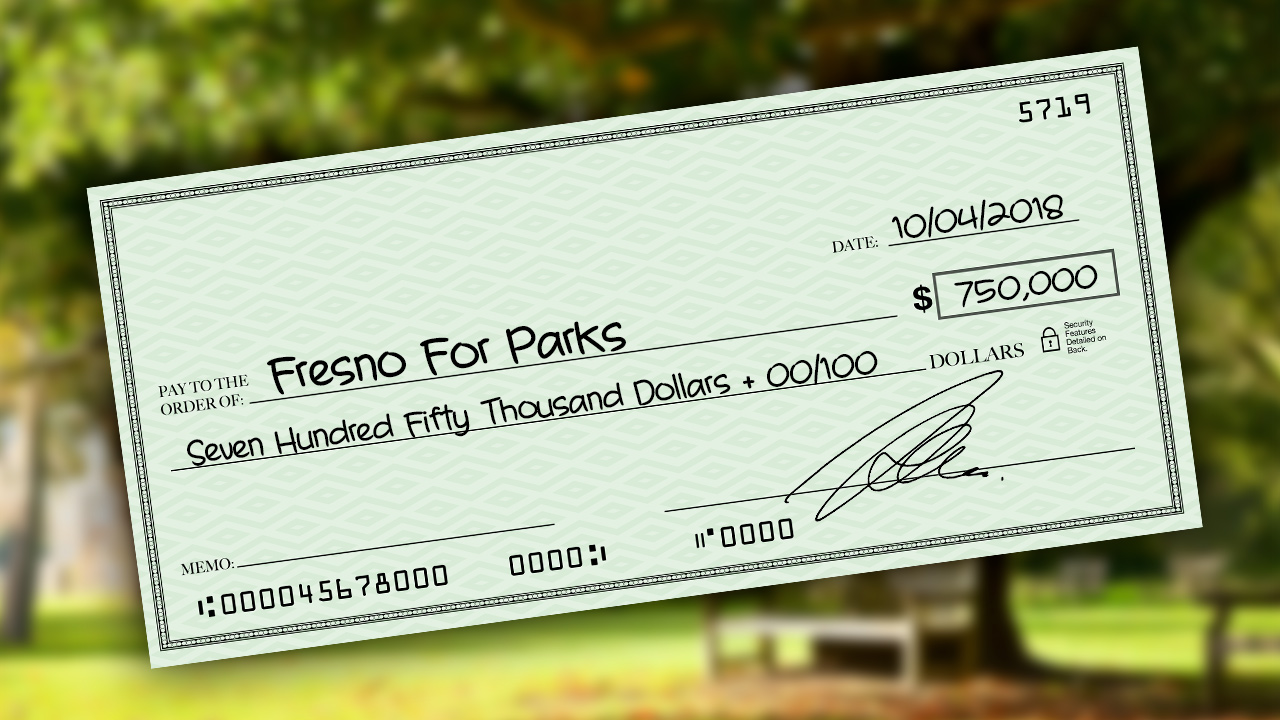 Photo Illustration of a check representing financial support for Yes on P committee