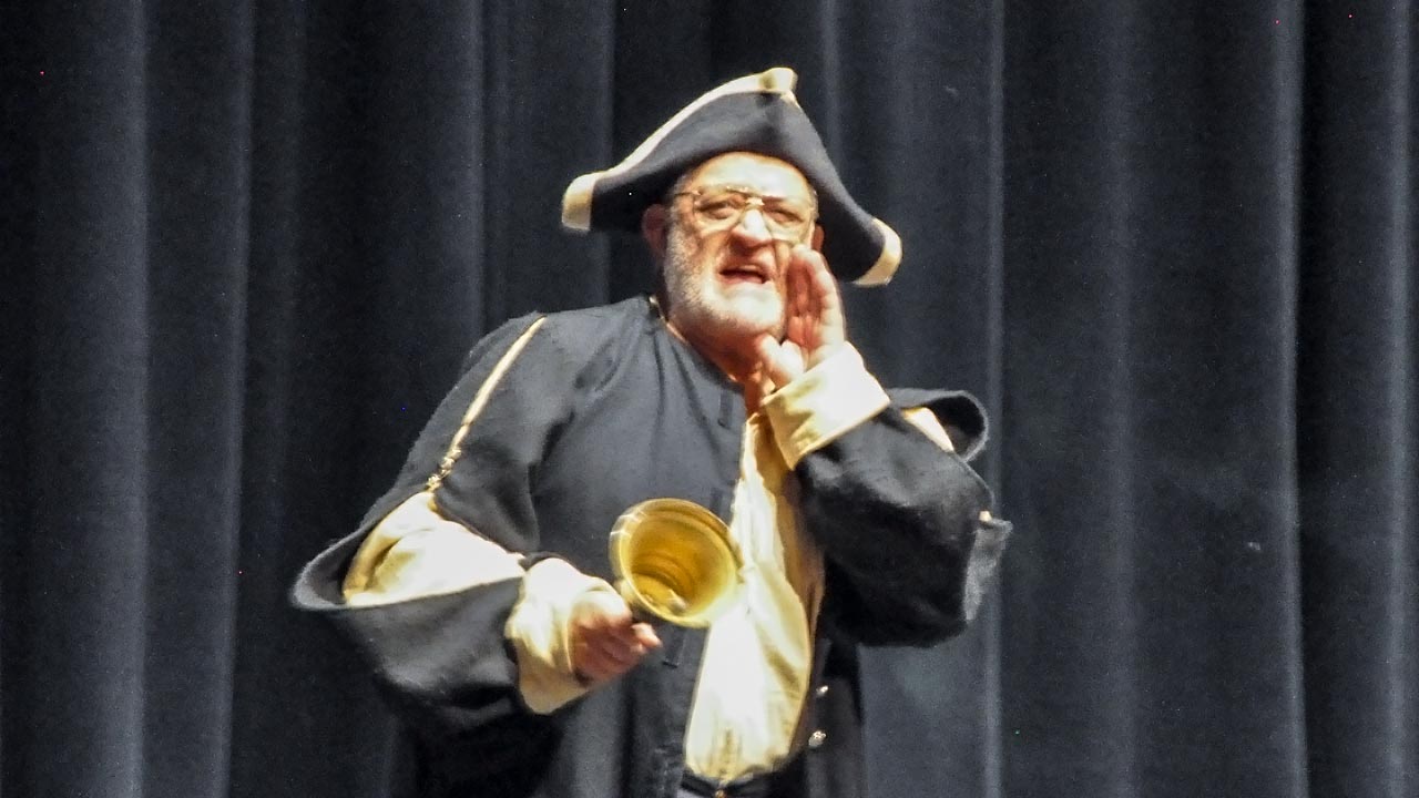 Photo of Raymond Ensher serving as the Town Crier for Valley Town Hall