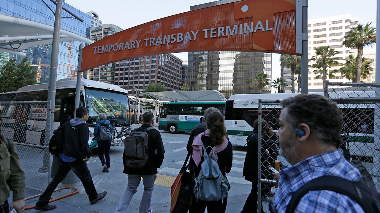 Photo of commuters making their way into the Temporary Transbay Terminal after the Salesforce Transit Center was closed