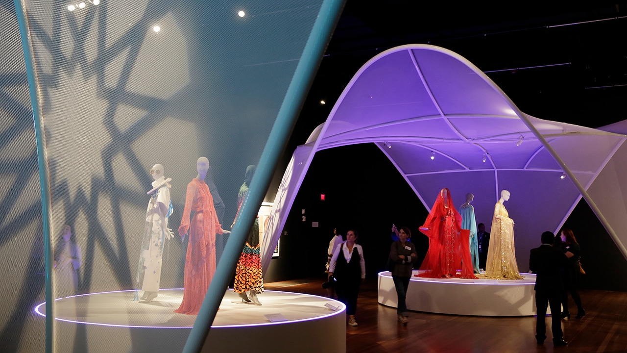 Photo of exhibit at de Young Museum showing off modern Muslim fashion