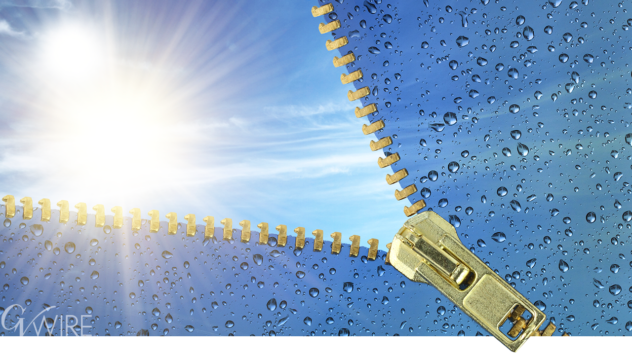 Image of a zipper covering up the sun with the arrival of rain