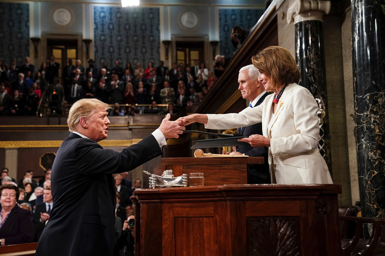 Photo of Trump and Pelosi shaking hands
