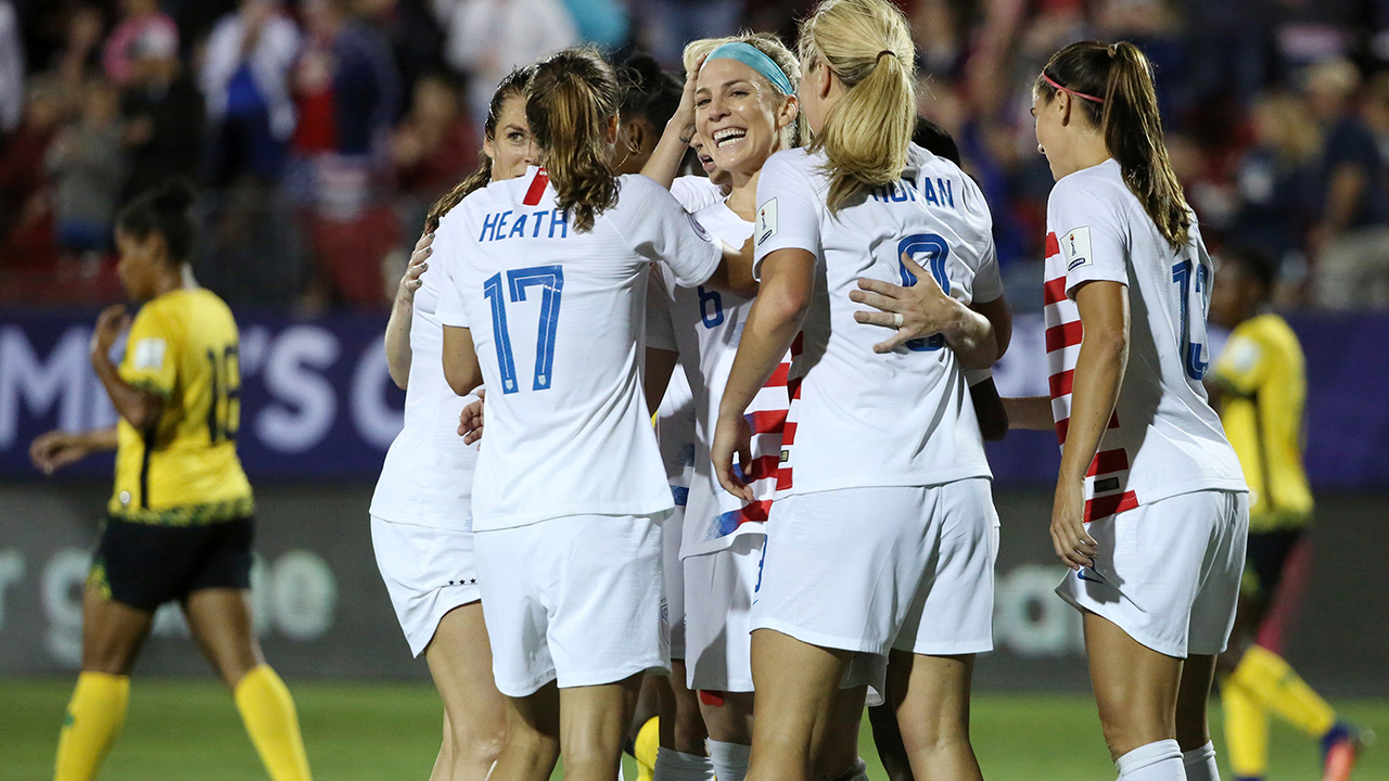 Photo of US Women's Soccer Team celebrating after win over Jamaica