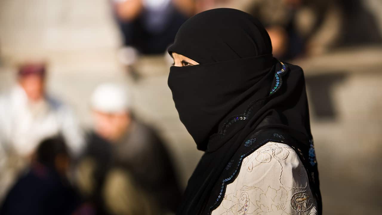 Photo of Uighur Muslim woman