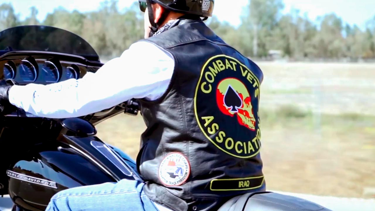 Photo of a veteran riding a motorcycle