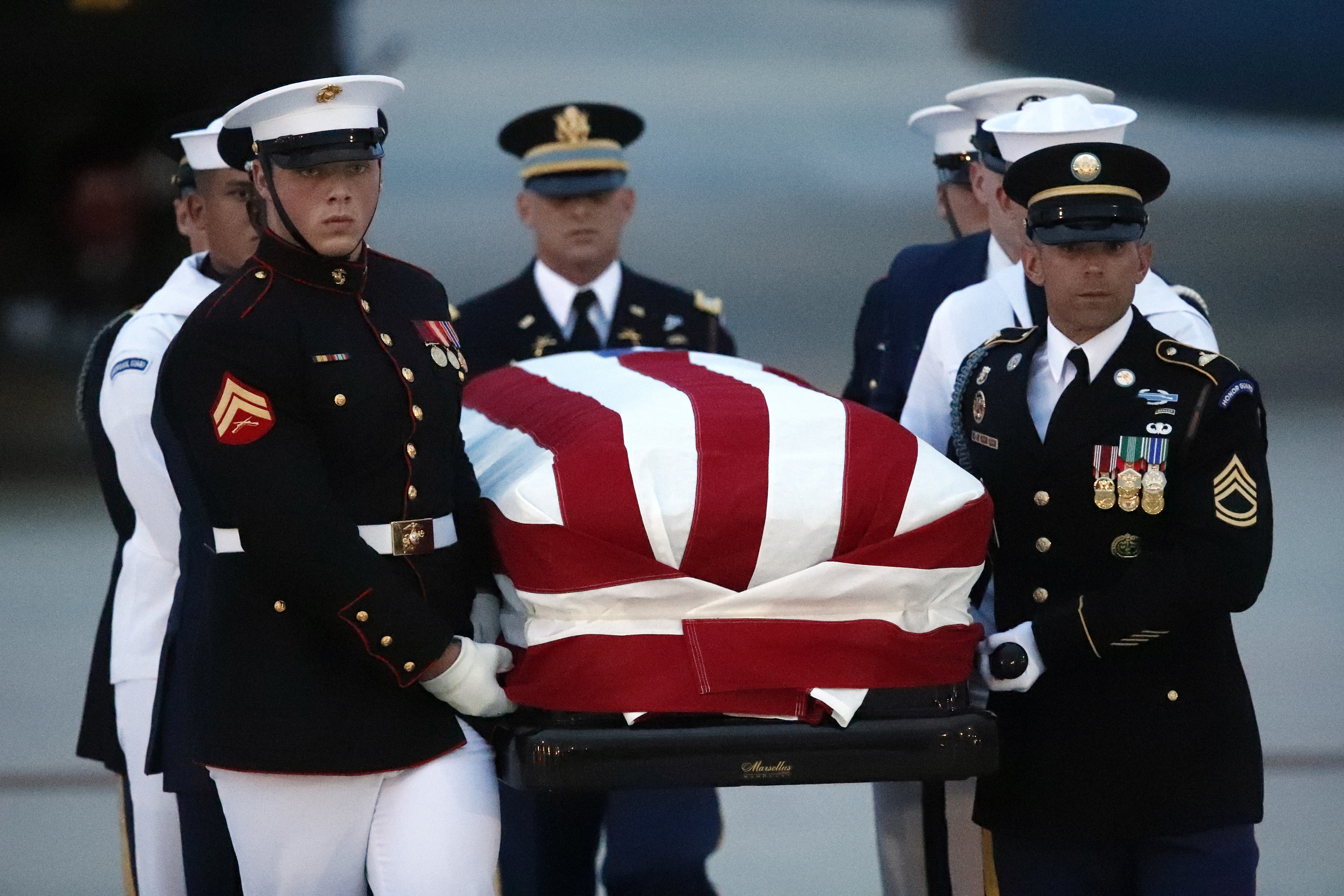 Photo of Armed Forces carrying John McCain's flag-draped casket