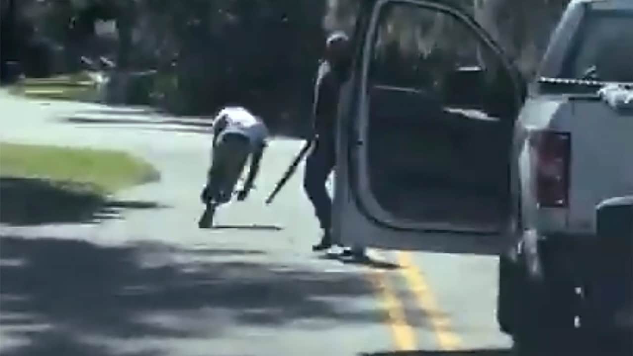 Photo of Ahmaud Arbery stumbling and falling to the ground after being shot 