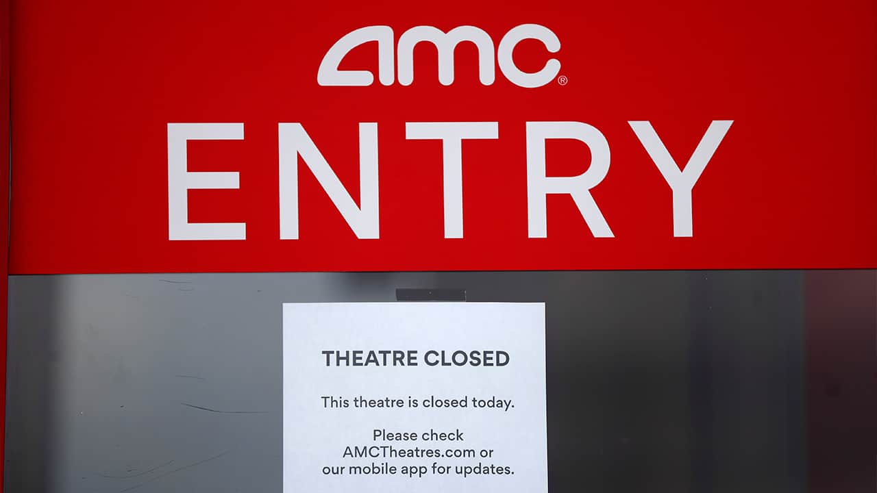 Photo of a closed sign at an AMC Theater