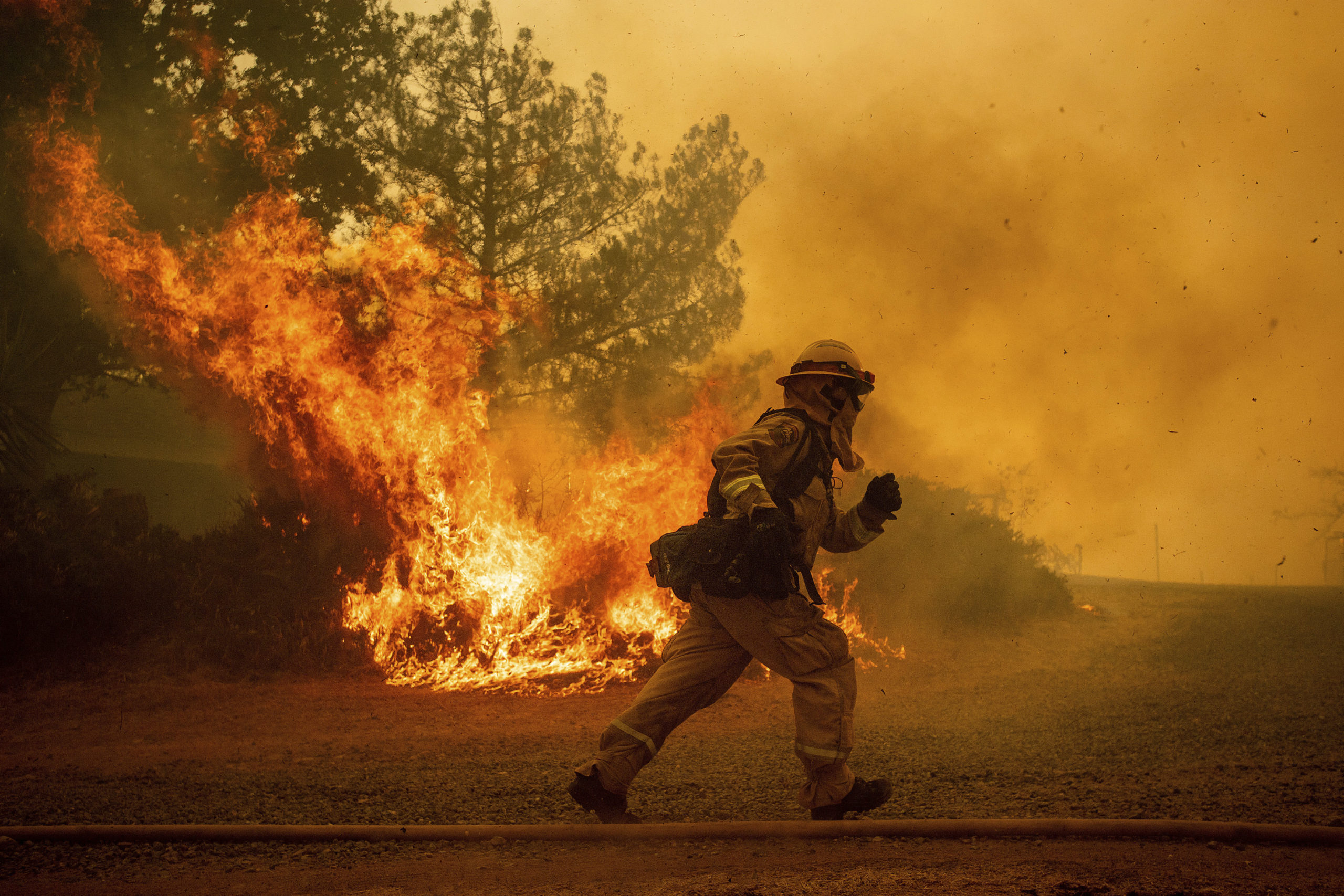 Photo of a running California firefighter
