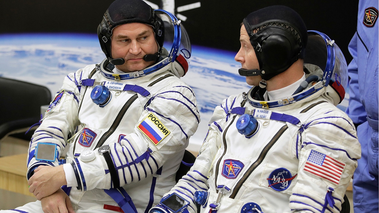 Photo of U.S. astronaut Nick Hague, right and Russian cosmonaut Alexey Ovchinin
